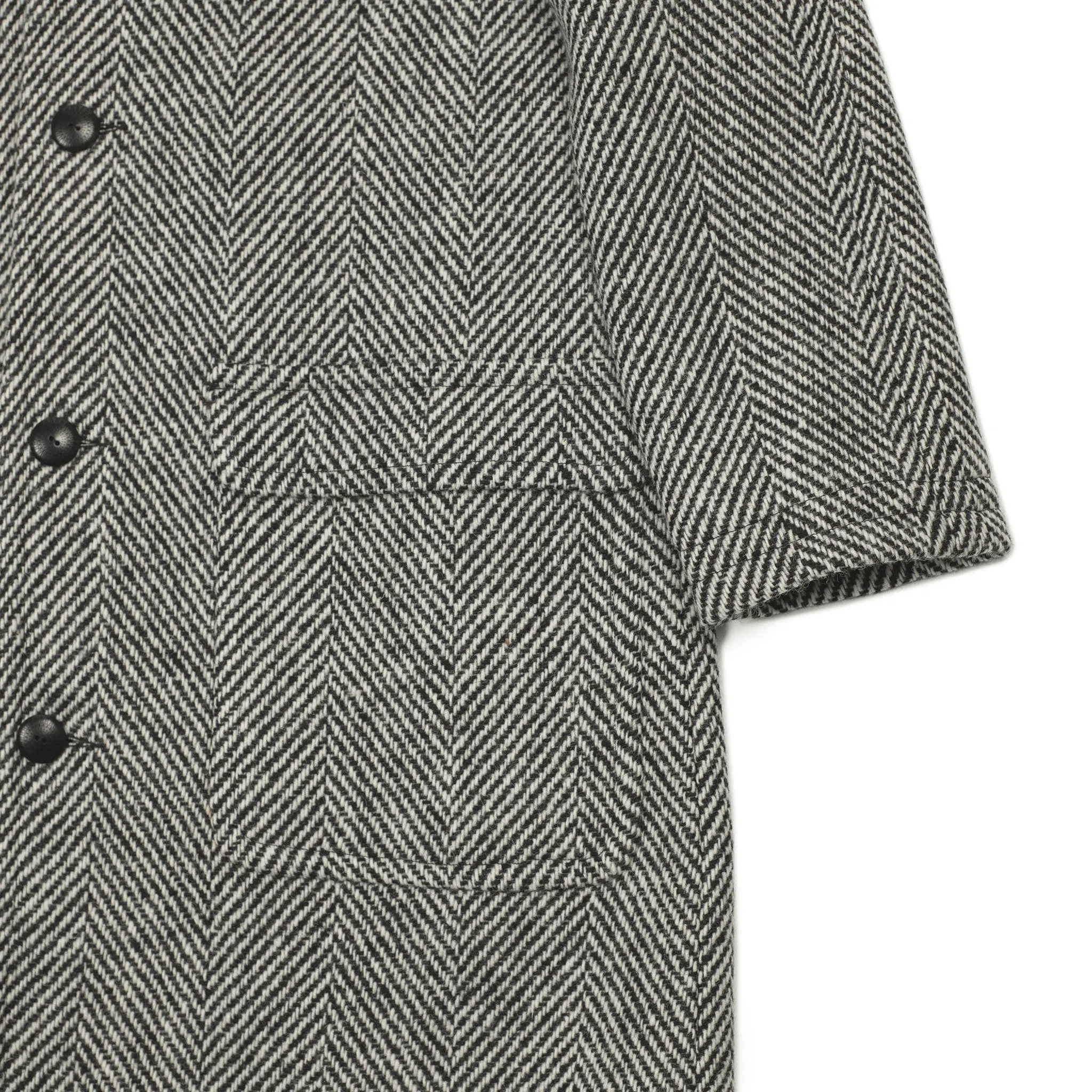 Balmacaan coat in black and white herringbone wool tweed